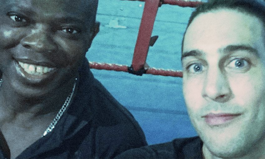 louis abbas with boxing ring in background